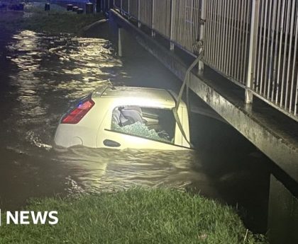 Birmingham floods: Man smashes car window to rescue mum and girl, 3