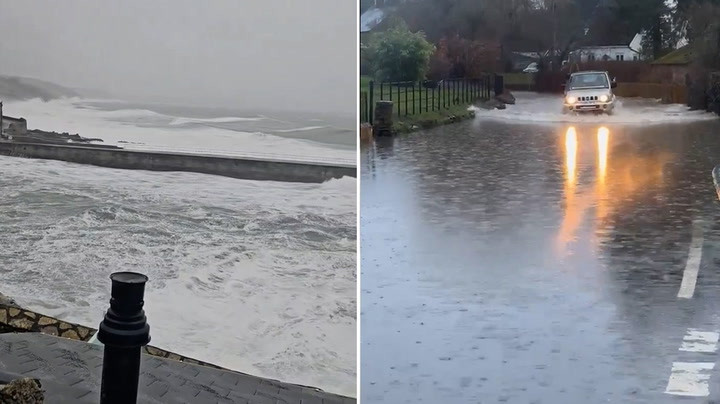 Car drives through floodwater as Storm Henk brings heavy rain to UK