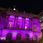 Landmarks glow purple to mark Holocaust Memorial Day