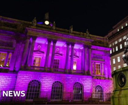 Landmarks glow purple to mark Holocaust Memorial Day