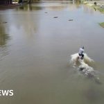 Man wakeboards through Berkshire flood water