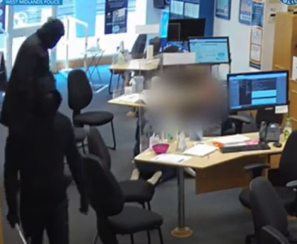 Moment violent masked gang bstorm travel agent armed with hammers and knives