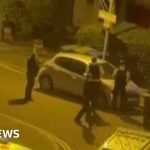 Police surround home after crossbow suspect reports