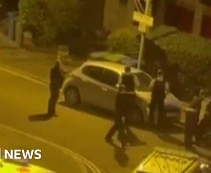 Police surround home after crossbow suspect reports