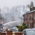 Primary school evacuated after suspected gas explosion in Bury, Greater Manchester