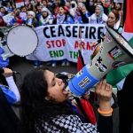 Thousands of pro-Palestine supporters march through London calling for ceasefire