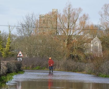 UK weather: Hundreds of flood warnings issued as heavy rainfall disrupts roads and railways - live