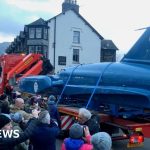 Donald Campbell's Bluebird welcomed home by crowds in Coniston