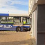 Five hospitalised after bus crashes into block of flats in Paisley