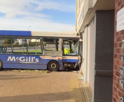 Five hospitalised after bus crashes into block of flats in Paisley