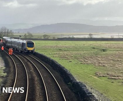 Hole found under track where train derailed