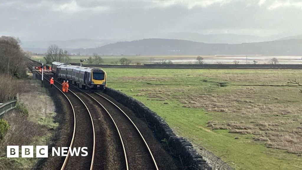 Hole found under track where train derailed