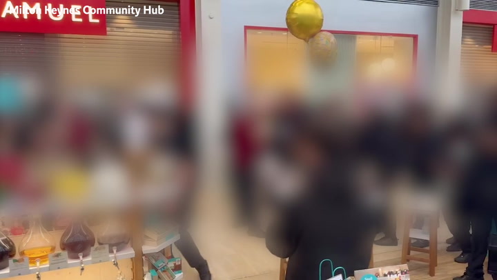 Moment 300 children storm shopping centre in Milton Keynes