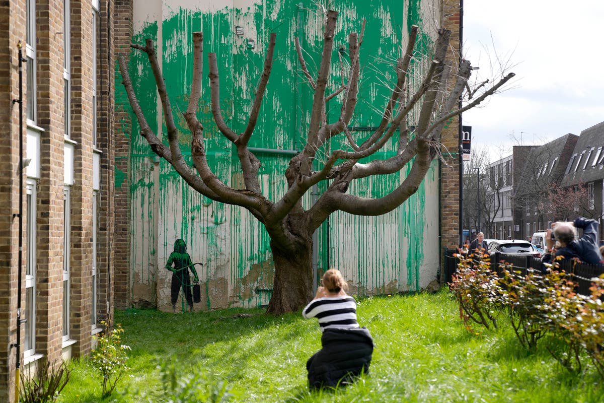 The meaning behind Banksy’s new London tree mural