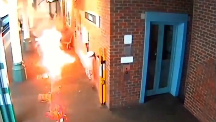 Moment e-bike bursts into flames during rush hour on London train platform