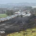 Landslip fear as travellers excavate behind homes