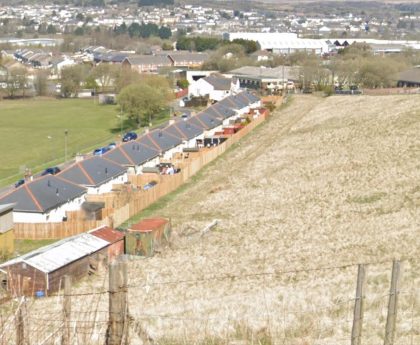 Travellers told to stop digging into Welsh hillside over fears of landslip