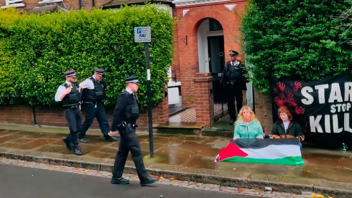 Pro-Palestine protesters demonstrate outside Keir Starmer