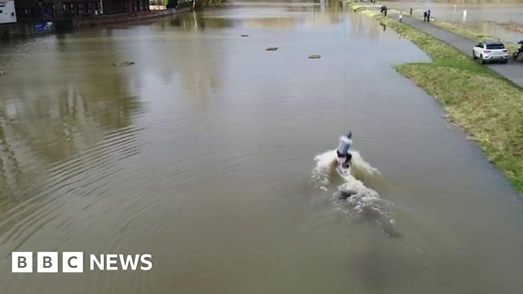 Man wakeboards through Berkshire flood water