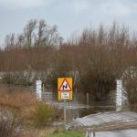 Flood warnings in place across England and Wales as heavy rain and strong winds