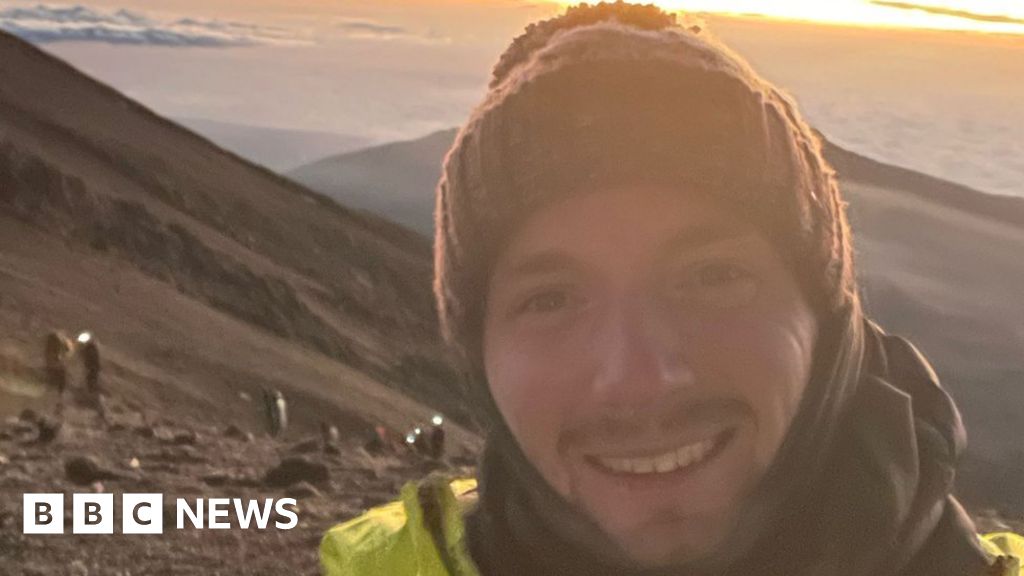 Trainer who scaled peak backwards raises thousands