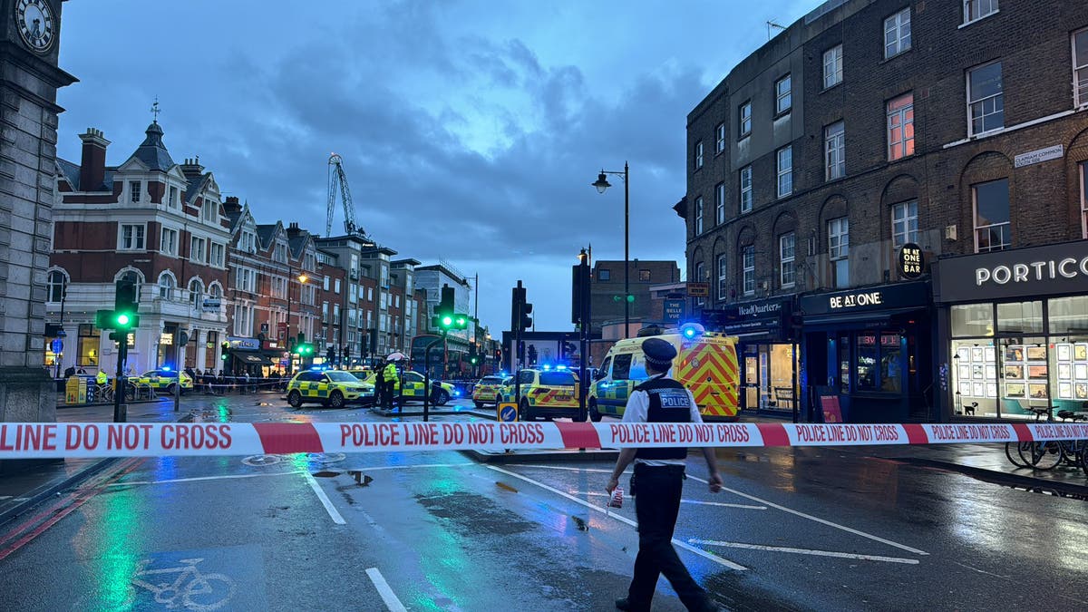 Clapham shooting latest updates: Three injured after gunman opens fire outside pub as police hunt suspect