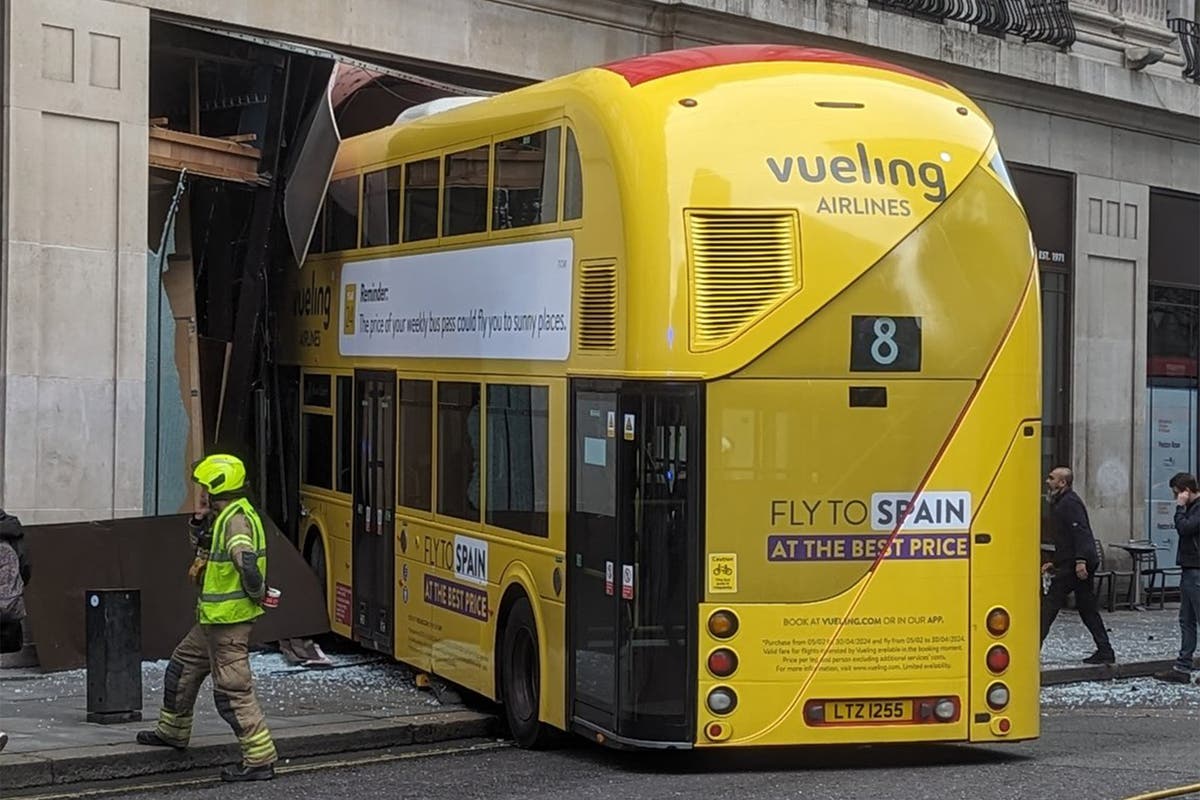 Double decker bus smashes into pub near Oxford Street in London